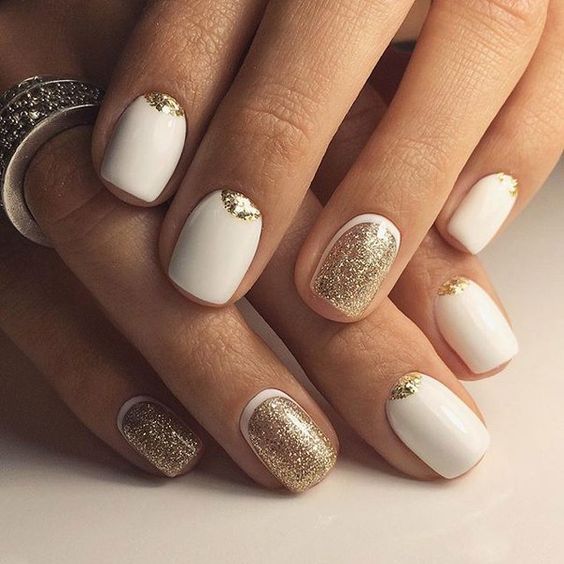 white nails with gold - half moon nails in both colors
