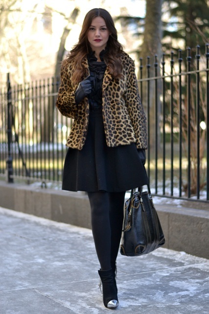 With black dress, black tights, ankle boots and tote