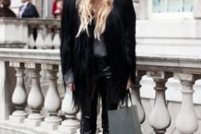 With black fur coat, leather pants and two color tote