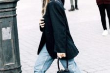 With black oversized blazer, crop jeans, black ankle boots and unique bag