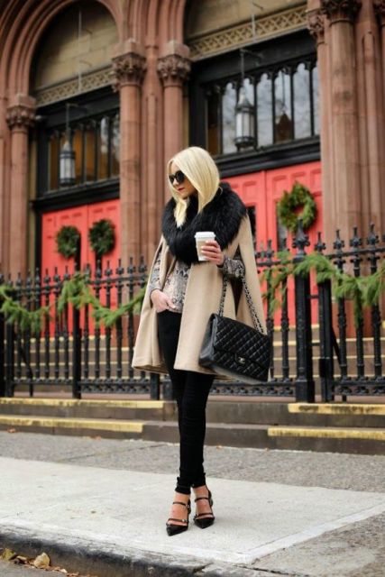 With black pants, heels and chain strap bag