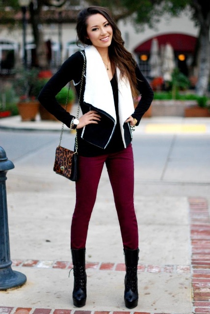 With black shirt, marsala pants, black high boots and leopard bag