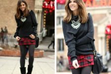 With black sweater, plaid skirt, gray tights and leather bag