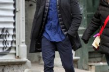 With blue shirt, puffer vest, coat and navy blue pants