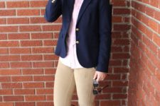 With button down shirt, navy blue blazer, beige skinny pants and brown high boots
