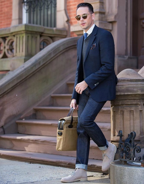 With cuffed jeans, navy blue blazer, gray vest and bag