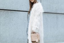 With dress, boots, faux fur coat and beige bag