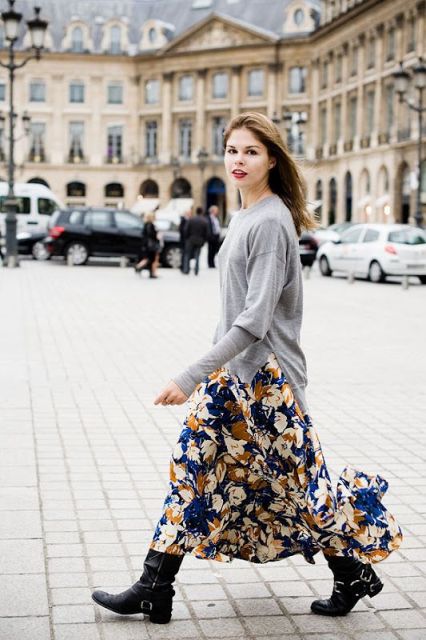 With gray loose sweater and floral maxi skirt