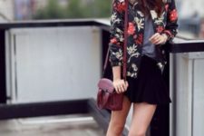 With gray shirt, black mini skirt, ankle boots, marsala bag and floral jacket