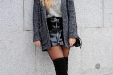 With gray shirt, tweed coat and over the knee boots
