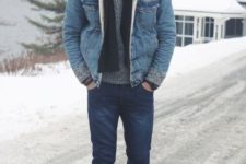 With gray sweater, black scarf, beige beanie, jeans and brown boots