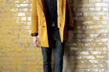 With gray trousers and yellow parka coat