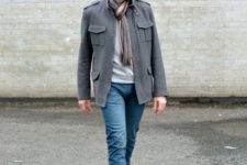 With light gray shirt, gray jacket, jeans, beige shoes and printed scarf