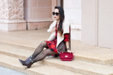 With plaid dress, black tights, heeled boots and red bag