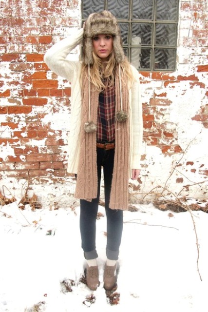 With plaid shirt, white cardigan, knitted scarf, cuffed jeans and boots