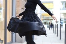 With pleated skirt and turtleneck