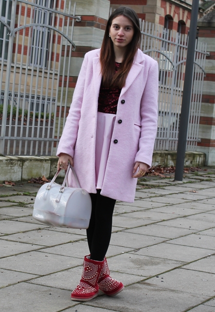 With shirt, pink skirt, pink coat, white bag and black tights