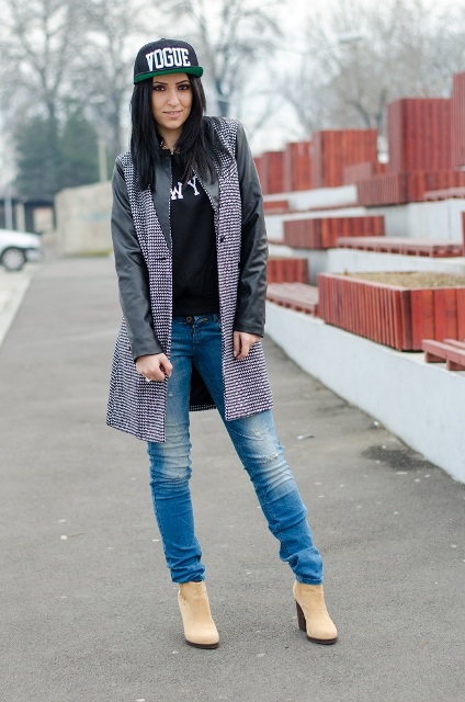 With t shirt, jeans, leather sleeve printed coat and beige boots