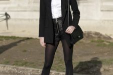With white button down shirt, black blazer, small bag and ankle boots