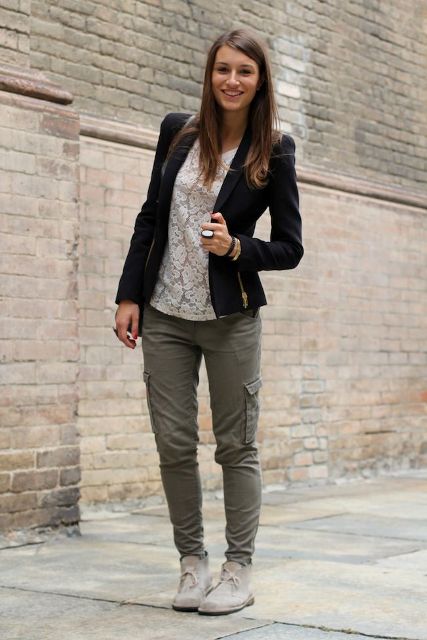 With white shirt, black blazer and olive green pants