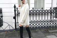 With white sweater dress and black over the knee boots