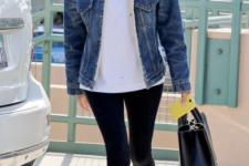 With white t-shirt, leggings, black leather boots and black leather bag