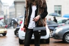 With white t-shirt, skinny pants, black jacket, fur vest and chain strap bag