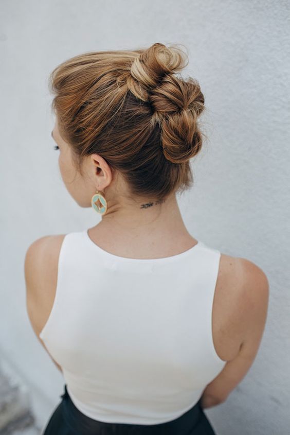 a catchy and creative updo made of a ponytail, with a bump on top is a cool solutoin for the holidays