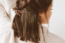 a creative dark brown half up wedding hairstyle with large braids on top and hair down is a cool idea for a lovely and cool party outfit