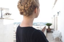 a lovely Christmas updo with a large and volumetric braided halo is a cool and chic idea for the holidays