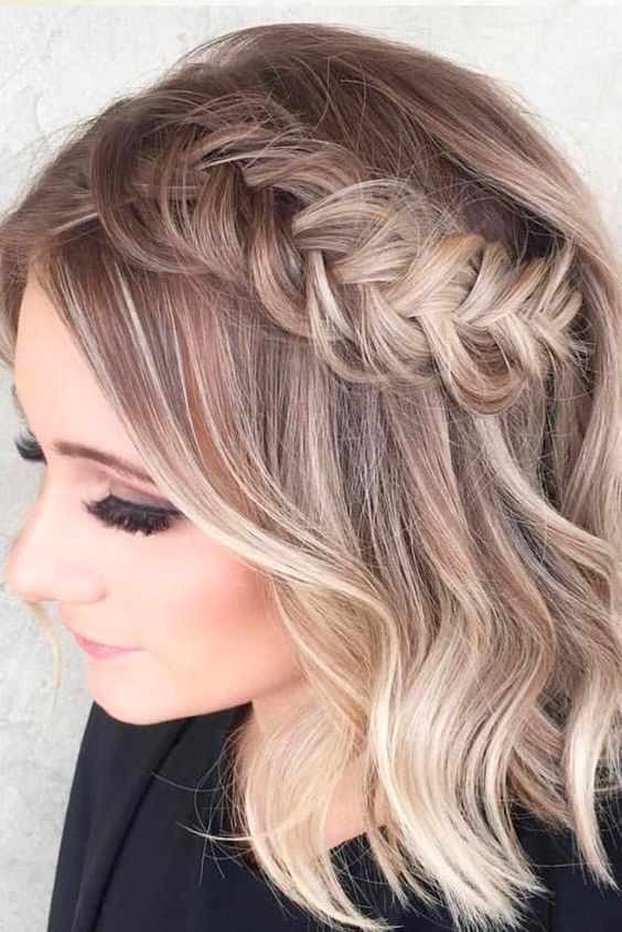 a lovely and chic half updo with a loose braid and hair down is a cool solution for medium length hair