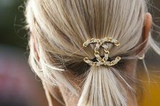 a perfect last-minute Christmas hairstyle for short hair, just a ponytail accented with a rhinstone logo hair piece