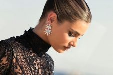 an elegant top knot with a sleek top is always a good that works for most of styles, a perfect holiday updo