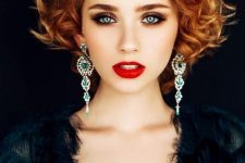 short ginger hair in curls showing off statement earrings is amazing for a party and looks jaw-dropping
