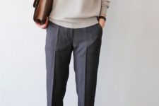 03 a neutral cashmere sweater, grey trousers, grey sneakers and a brown leather bag for a relaxed work look