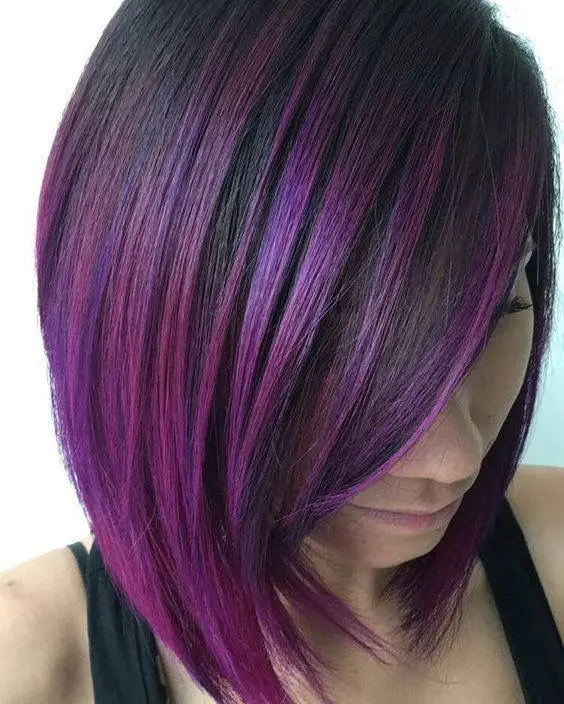 short sleek bob haircut with purple and fuchsia balayage is a trendy way to stand out