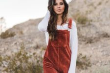 11 a white long sleeve sweater and a rust velvet overall for a cozy look with a retro feel