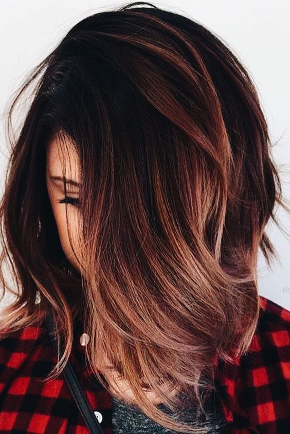 black roots with burgundy and fiery red balayage is great for those who want some color
