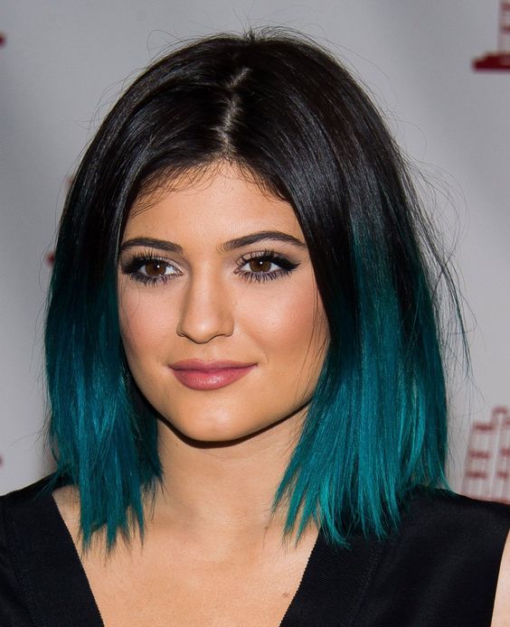 a black root with turquoise ombre for a super bold look