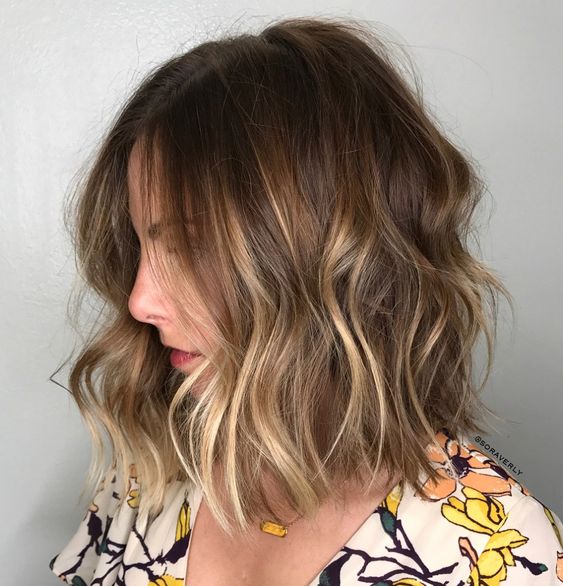 Picture Of A Medium Shaggy Bob Haircut With Blonde Balayage To