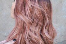 12 blonde hair and rose gold highlights with waves for a non-typical look