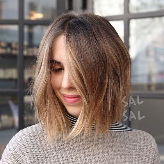 A short shaggy bob with blonde balayage to make the hair look more eye catching