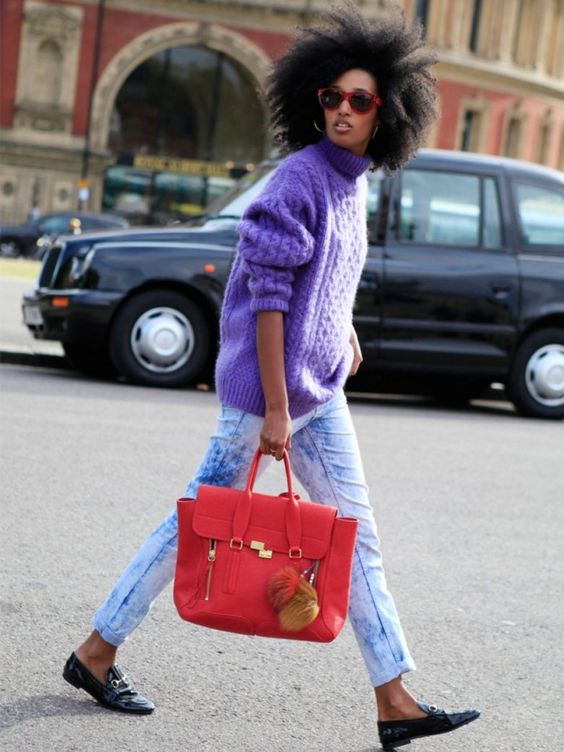 bleached denim, an ultraviolet sweater, black flats and a red bag for a colorful look