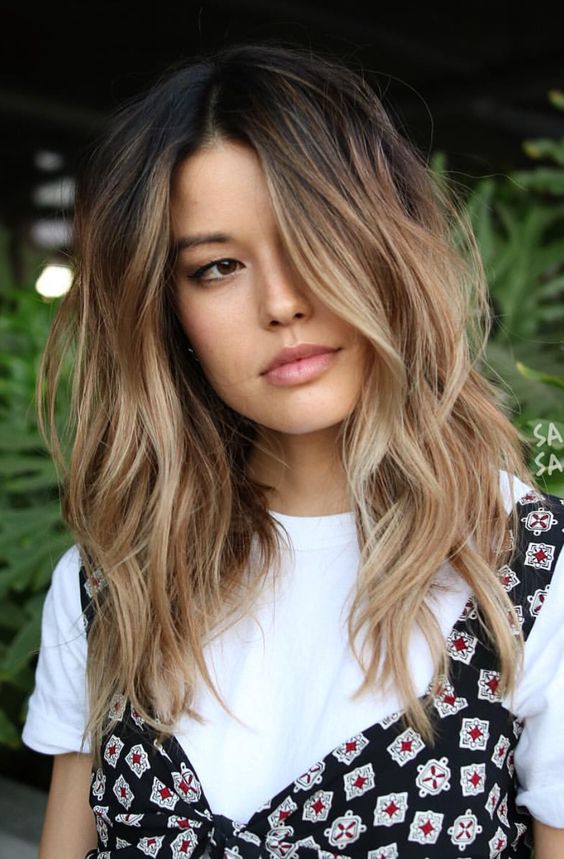 black hair with bronde and blonde balayage is a stylish way to wear light hair colors