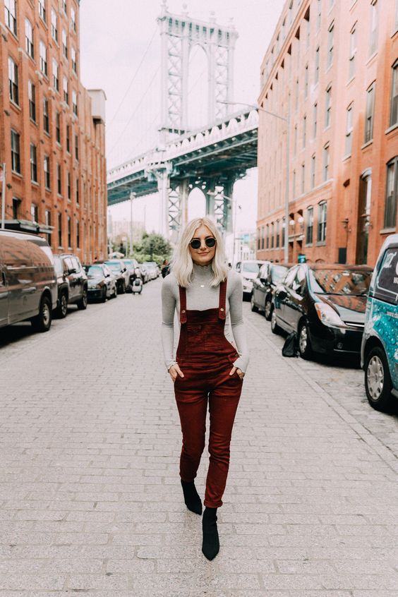 black suede sock boots, a grey turtleneck and a burgundy velvet overall for a stylish look