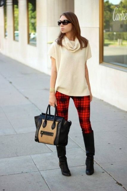 With beige sweater, high boots and two color bag