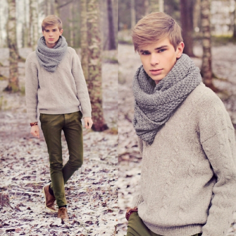 With beige sweater, olive green pants and brown shoes