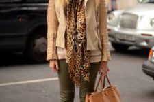 With beige sweatshirt, beige leather jacket, olive green pants, brown suede boots and brown tote