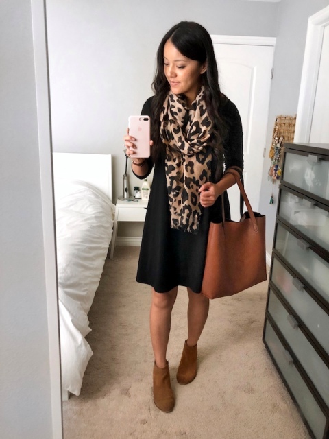 With black dress, brown tote and brown suede boots