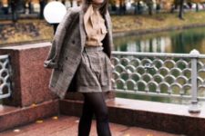 With brown blouse, tweed blazer, black tights and ankle boots